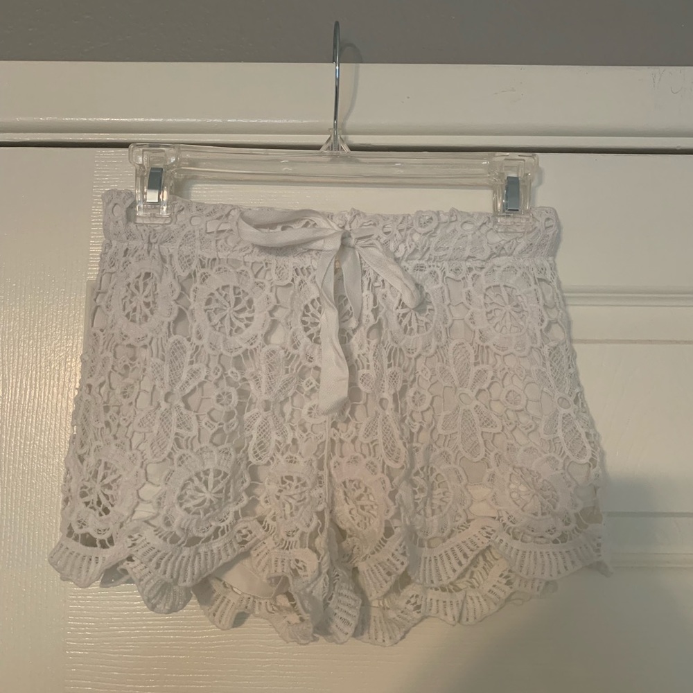 White lace shorts